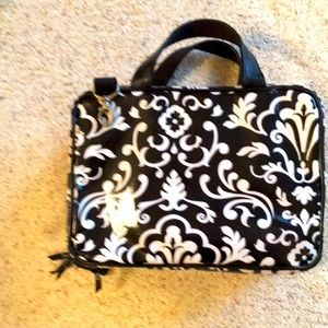 Two sided toiletries kit with removable inserts and many pockets!